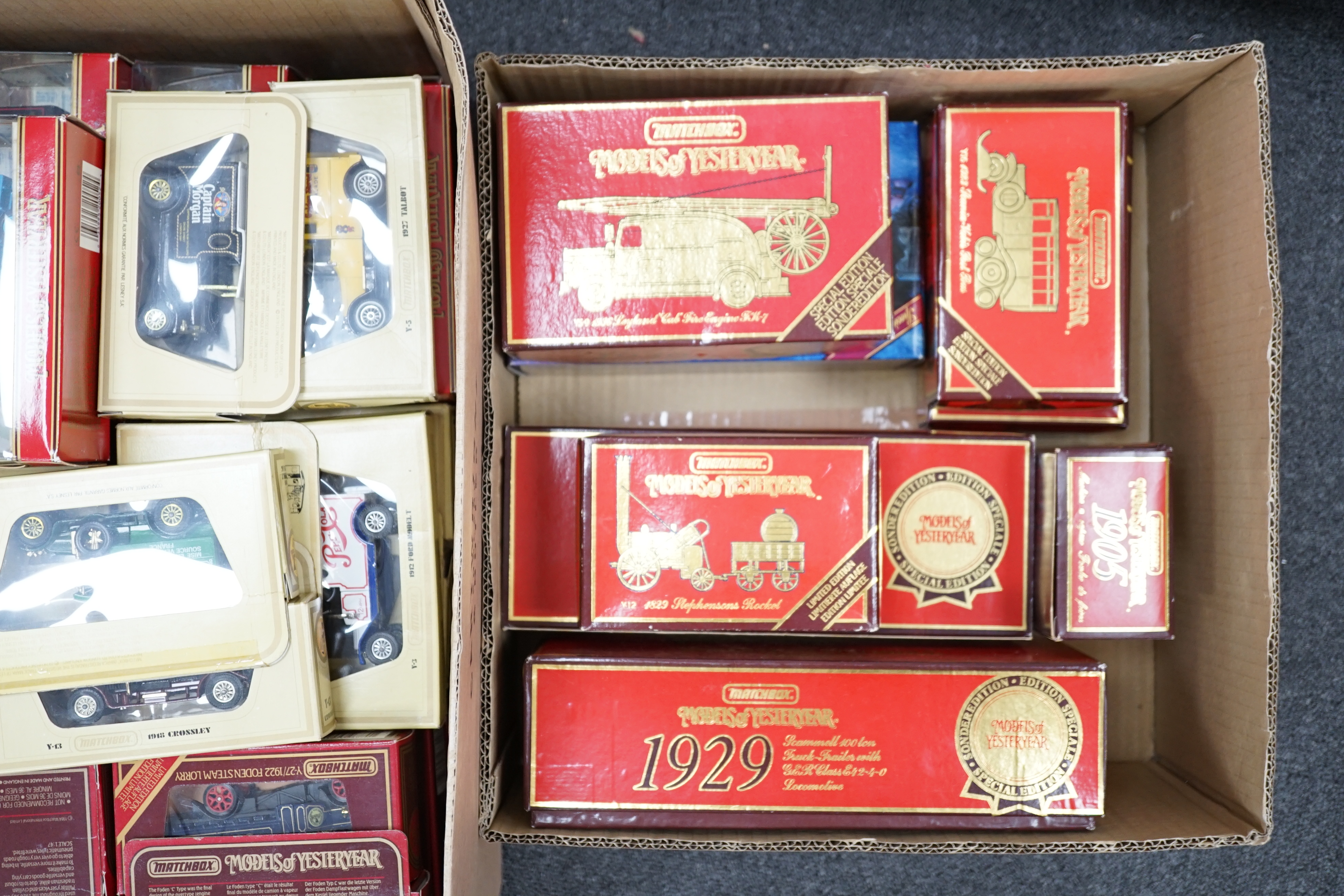 Sixty-six Matchbox Models of Yesteryear, in cream or maroon era boxes, including cars, commercial vehicles, fire engines, a Stephenson’s Rocket, etc.